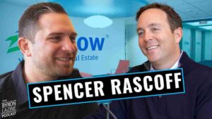 Two men smiling during a podcast interview, with a bold 'SPENCER RASCOFF' banner across the foreground.
