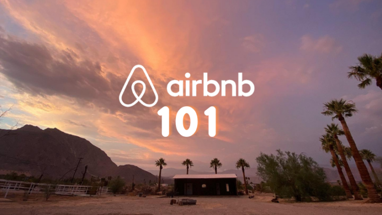 Airbnb 101 course cover over a desert sunset with palm trees and a small building in the foreground