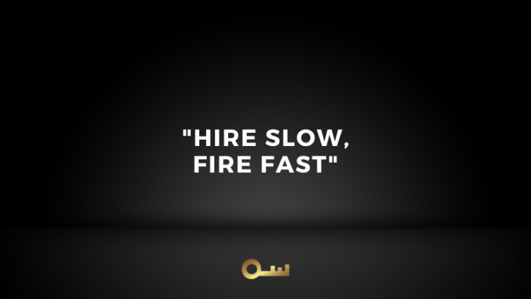 Dark gradient poster with the quote 'HIRE SLOW, FIRE FAST' centered, and a small gold key icon at the bottom.