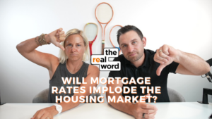 Two hosts at a table give thumbs down in a video thumbnail about mortgage rates and the housing market, with the real word logo visible and the title text overlaid: 'WILL MORTGAGE RATES IMPLODE THE HOUSING MARKET?'