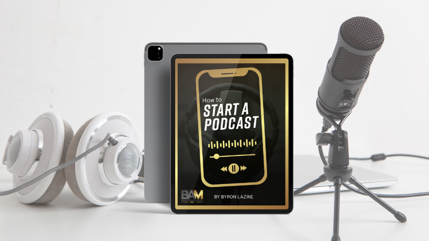 Podcast setup with a tablet displaying 'How to Start a Podcast,' framed by headphones, a tablet/iPad, and a microphone on a stand on a white desk.