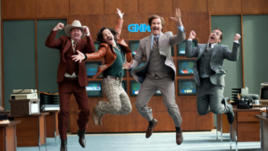 Five news anchors jump in midair in a retro newsroom with GNN sign behind them, looking excited and energetic.