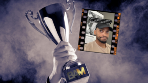 Person raises a silver trophy labeled BAM; a film-strip frame with a man’s selfie and caption floats beside it.