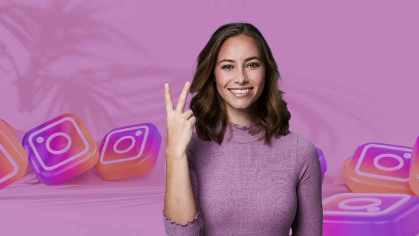 Smiling woman in a purple sweater making a peace sign with Instagram logo blocks in a pink background behind her.