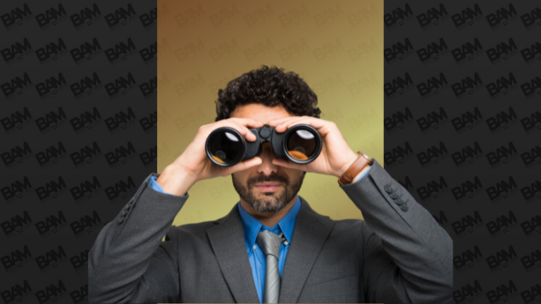 Professional man in a gray suit uses binoculars, looking ahead against a gold gradient background.