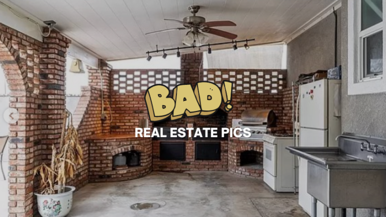 Brick outdoor kitchen with two brick ovens, grill, fridge and sink under a covered patio; ceiling fan above; overlay reads 'BAD! REAL ESTATE PICS'