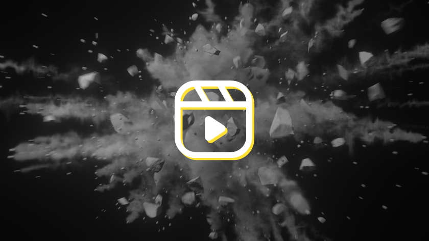 Video thumbnail with a yellow-framed play button in the center, surrounded by a dynamic explosion of debris on a dark background.