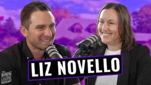 Two podcast hosts, a man and a woman, smile into studio microphones; bold 'LIZ NOVELLO' banner overlays the scene.