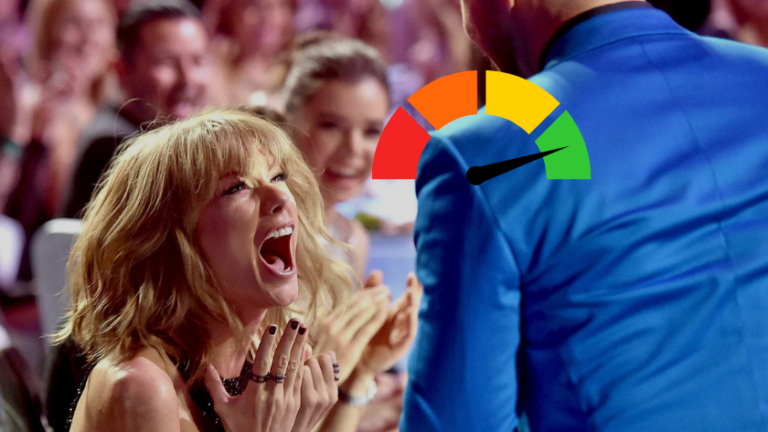 Woman in the crowd shouts with excitement toward a performer in a blue suit, with a colorful gauge graphic overlaid on the scene indicating energy or hype.