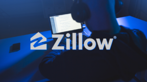 Person wearing headphones uses a laptop at a blue-lit desk with a Zillow watermark over the image.