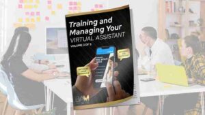 Magazine cover titled 'Training and Managing Your Virtual Assistant' held up in a bright office, showing a hand using a smartphone and stylus in the foreground.
