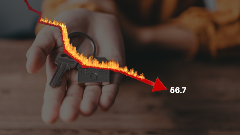 Hand holding a house key; a fiery red line climbs along the key toward the number 56.7, suggesting an upward trend.
