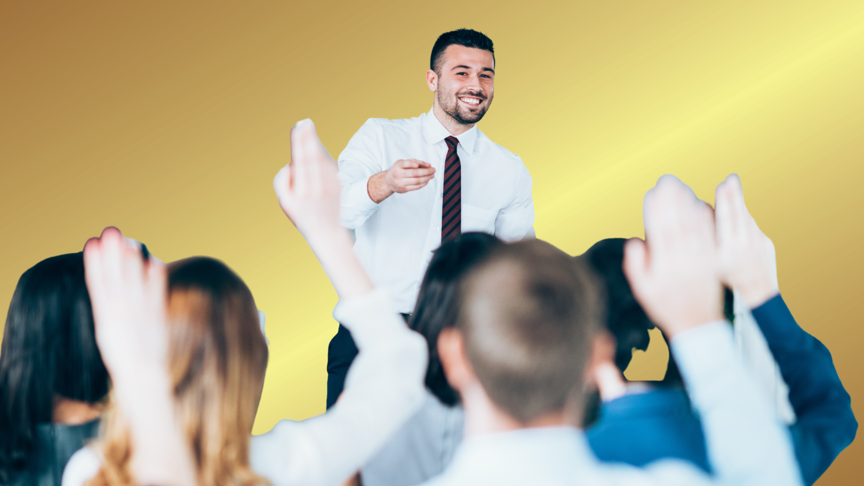 Speaker in a white shirt and striped tie high-fives a cheering crowd against a yellow gradient backdrop.