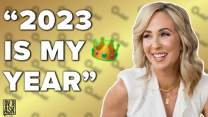 Thumbnail: smiling blonde woman on the right with bold text '2023 IS MY YEAR' and a crown emoji on a yellow background.