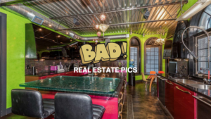 Vibrant bar interior with lime-green walls, black leather stools, glass-topped counter, and exposed ductwork; bold BAD! graphic over REAL ESTATE PICS.