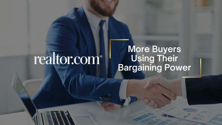 Two professionals shake hands over a desk with realtor.com branding and the headline 'More Buyers Using Their Bargaining Power'.