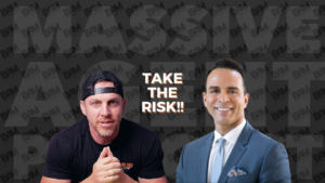 Two men flank a bold 'TAKE THE RISK!!' message on a dark patterned background.