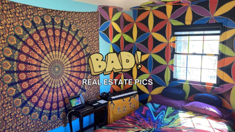 Bohemian bedroom with a mandala tapestry on the left wall, colorful geometric mural on the right, a window, keyboard on a small table, laptop, and a tie-dye bed with purple pillows.