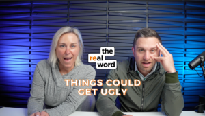 Two podcast hosts sit at a desk in a studio with a blue panel background; center logo reads 'the real word' and bold orange text at the bottom says 'THINGS COULD GET UGLY'