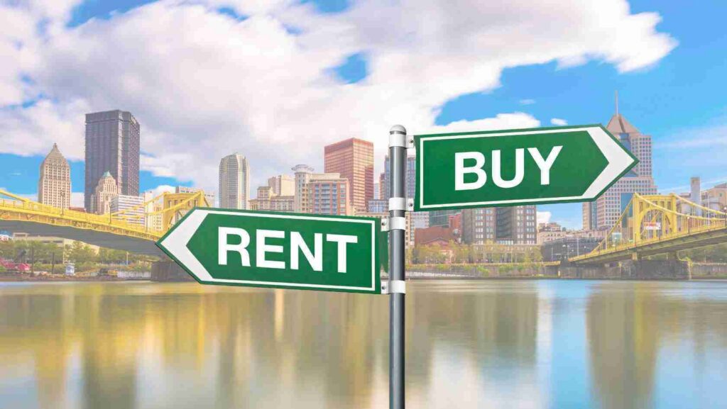 Signpost with green RENT and BUY arrows pointing in opposite directions in front of a city skyline and bridge over water, implying rent vs buy choice.