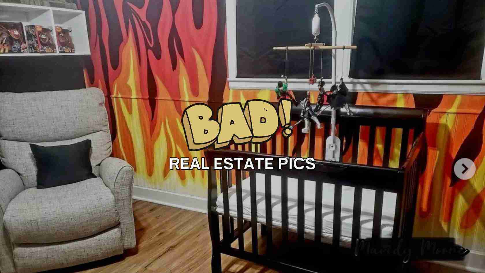 Nursery with a black crib, gray armchair, fiery wall mural, and a hanging toy mobile; overlay text reads 'BAD! REAL ESTATE PICS'.