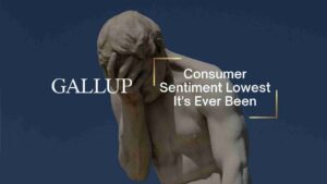 Statue covering its face on a dark blue background with the headline 'Consumer Sentiment Lowest It’s Ever Been' and the word 'GALLUP'.