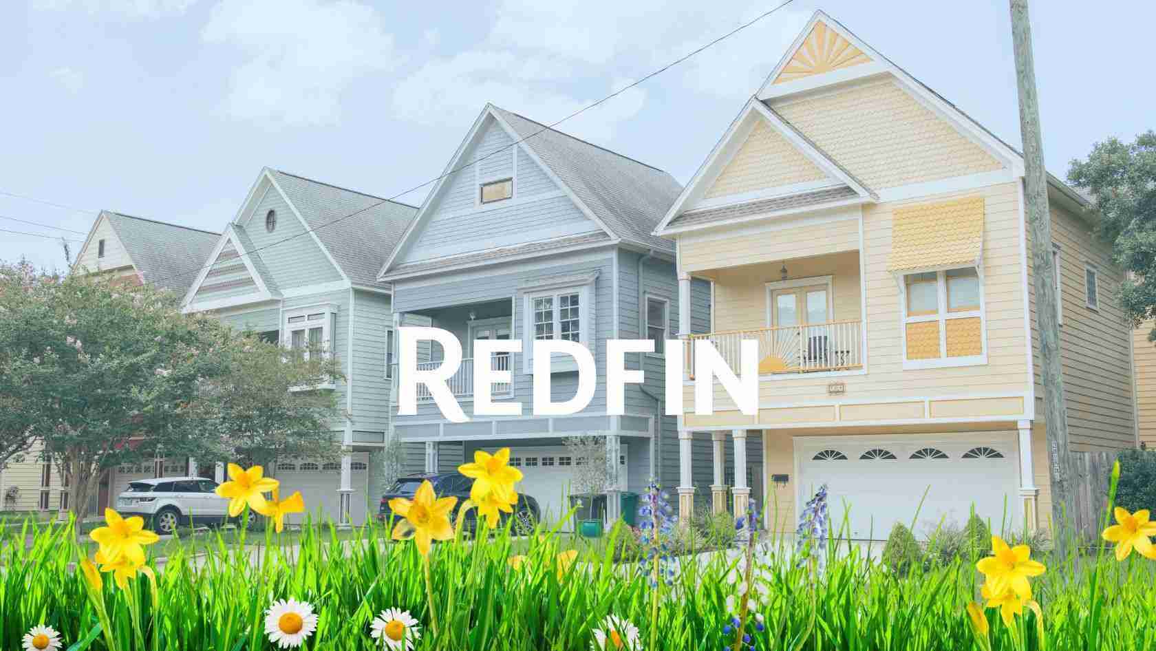 Row of pastel-colored houses with daffodils in the foreground and a large REDFIN logo overlaid across the scene.
