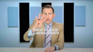 Video thumbnail: man in a tan suit at a desk, gesturing with three fingers, overlaid with the text 'HOW TO AVOID LOSING CLIENTS'