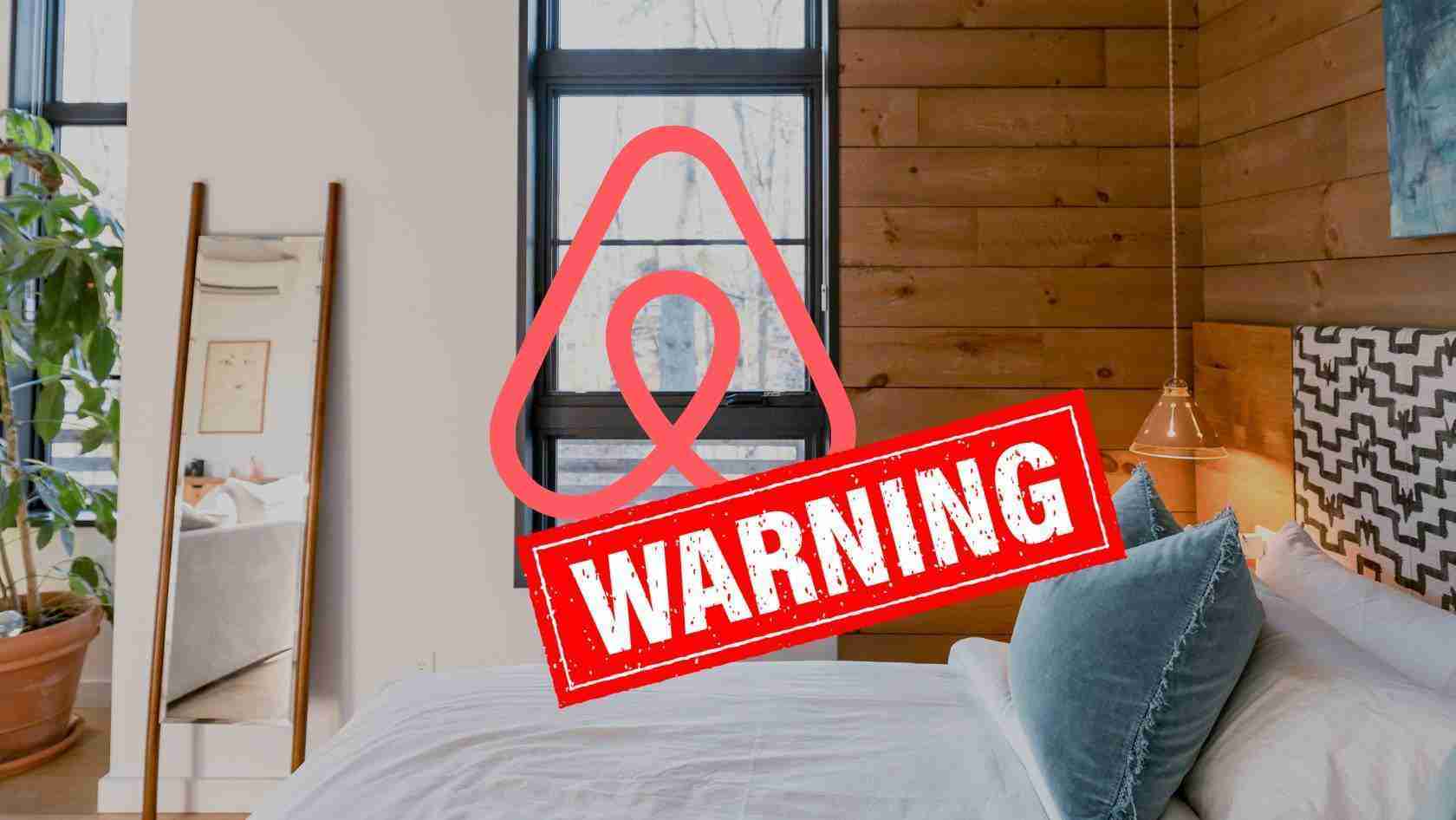 Bedroom with wood-paneled wall and a bed; a bold red 'WARNING' stamp overlays the image.