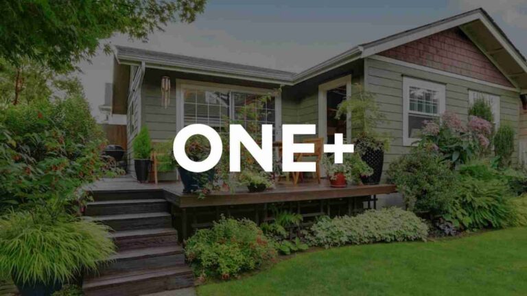 Home exterior with a wooden deck and abundant potted plants, featuring a large ONE+ overlay text on the center of the image. Divider line omitted for accessibility clarity.