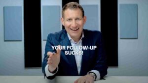 Smiling man in a blue blazer extends a hand; bold text reads 'Your follow-up sucks!' across the image (video thumbnail).