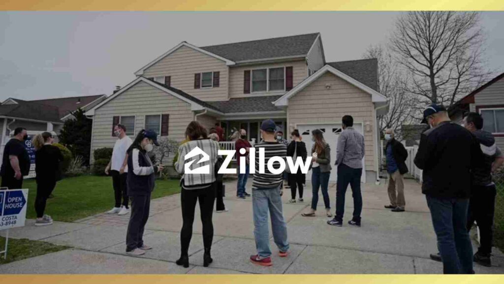 People stand in a line on the driveway of a beige two‑story house, attending an open house with a Zillow watermark across the image (masking visible).