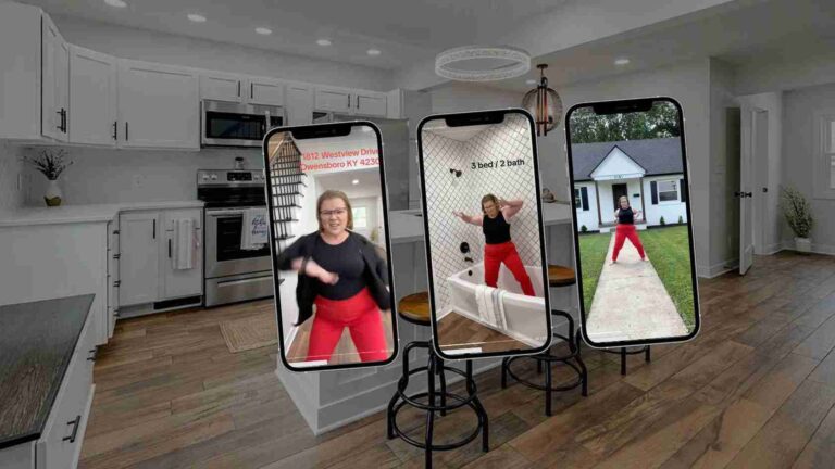 Three smartphone screens on stands display a woman exercising in a modern kitchen setting; outdoor house visible on the right.