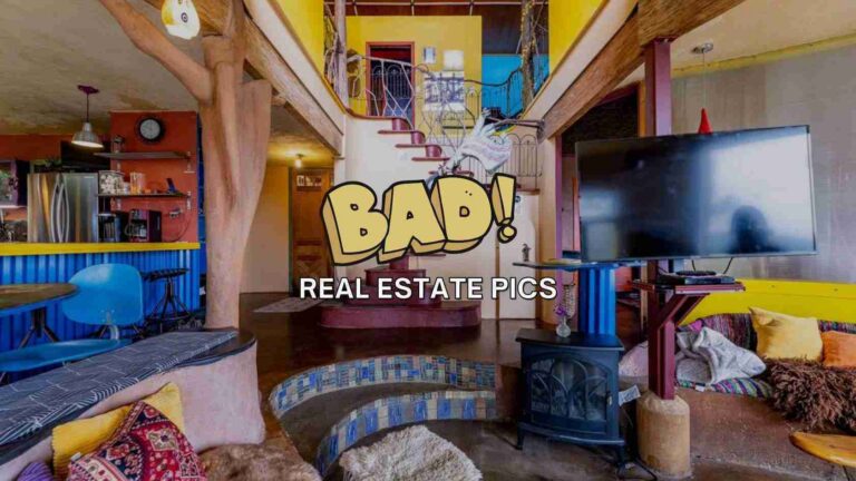 Bright, eclectic living space with blue seating, yellow walls, a fireplace, stairs, and a large TV, overlaid with a bold 'BAD!' cartoon and 'REAL ESTATE PICS' text.