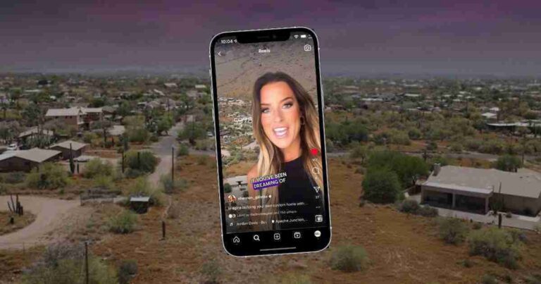 A smartphone displaying a video/story on a social app, hovering over a desert suburban landscape.