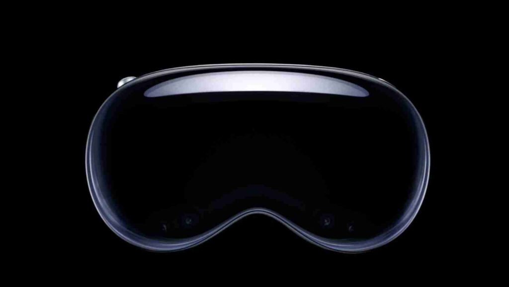 Front view of a glossy black VR headset lens against a black background, with a curved, reflective rim.
