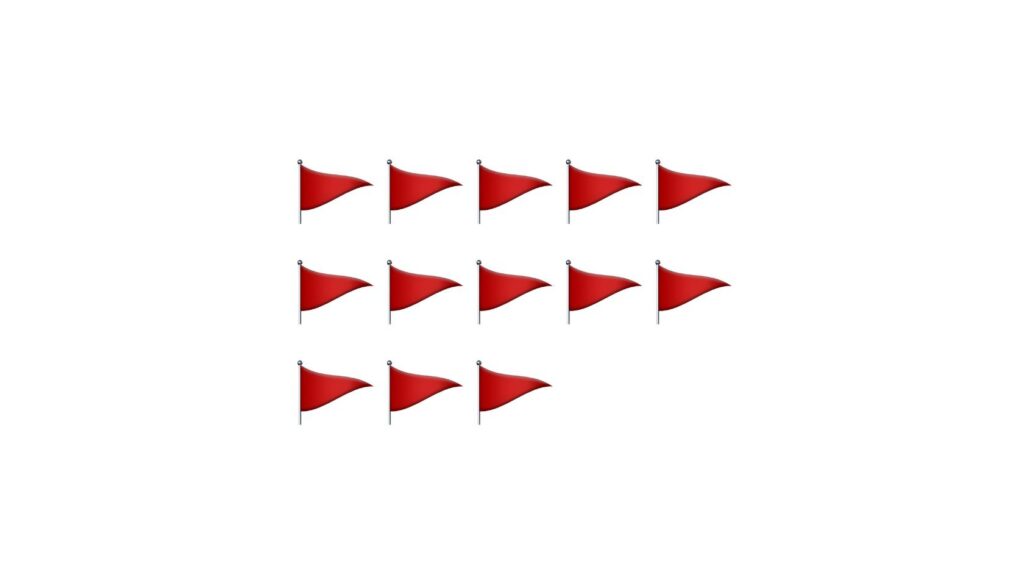 Five red pennant flags on poles in the top row, five in the middle row, and three in the bottom row.