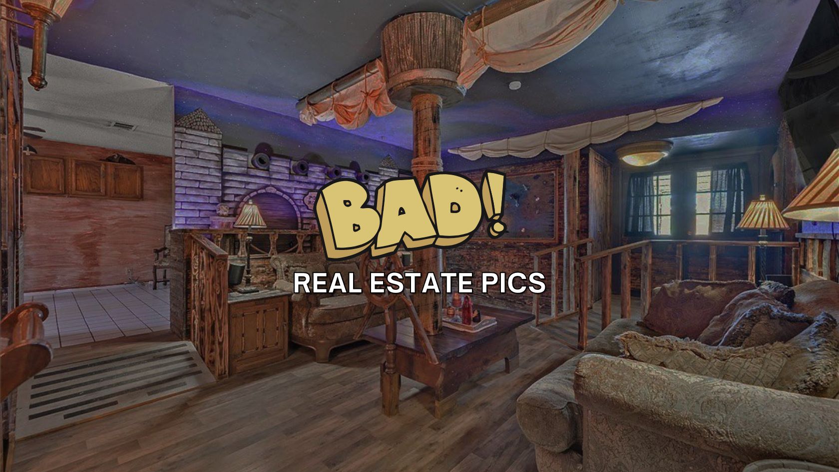 Rustic living room with wooden furniture and ship-themed ceiling; large couch and warm lamps, overlaid with bold 'BAD! REAL ESTATE PICS' text.