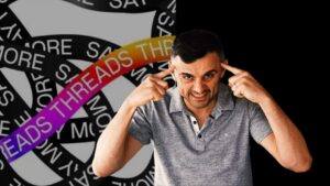 Man grimaces and points to his temples, signaling mental effort, with a background of overlapping black-and-white rings and a colorful tape reading 'READS' and 'THRE' across the scene.