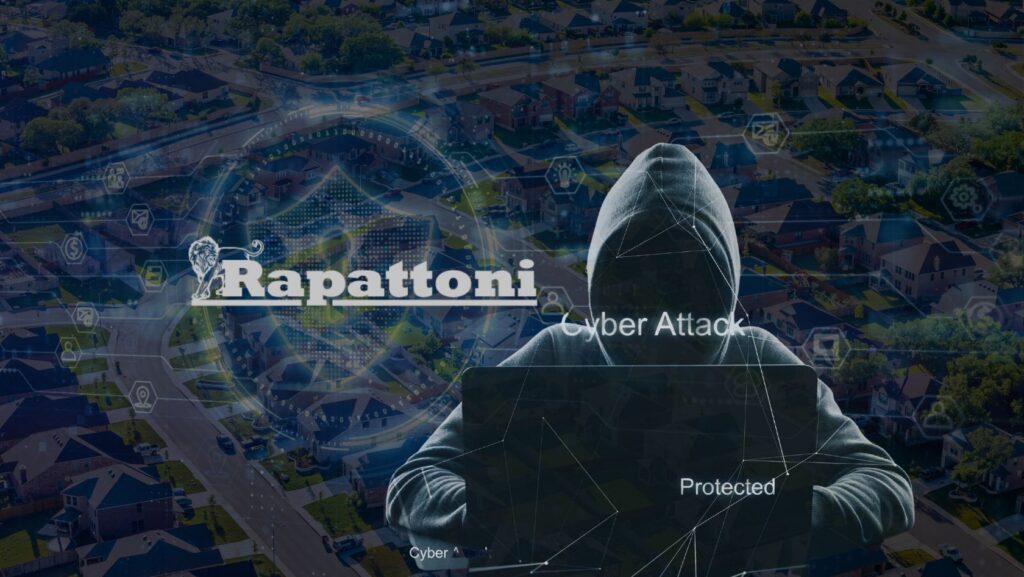 Hooded figure using a laptop over a suburban cityscape, with 'Cyber Attack' and a company logo in the foreground (cybersecurity theme).