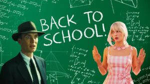 Man in a suit and fedora and a woman in a pink checkered dress stand against a green chalkboard with 'BACK TO SCHOOL!' written in chalk and math equations all around.