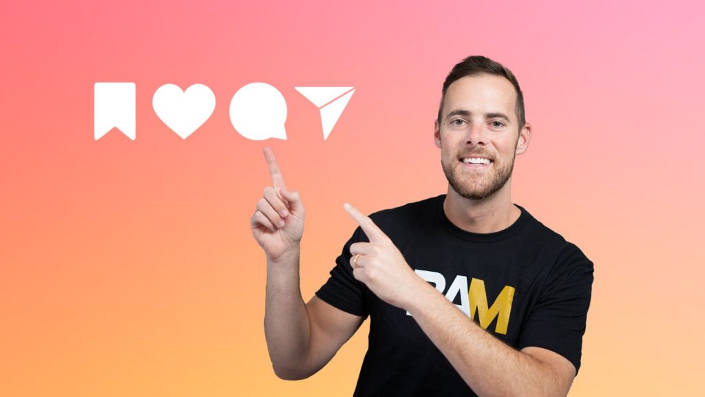Smiling man in a black T‑shirt points at white social icons (bookmark, heart, chat, paper plane) on a pink–orange gradient background.