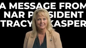 Video thumbnail of NAR President Tracy Kasper, a blonde woman in a beige blazer, with large white text on a black background behind her.