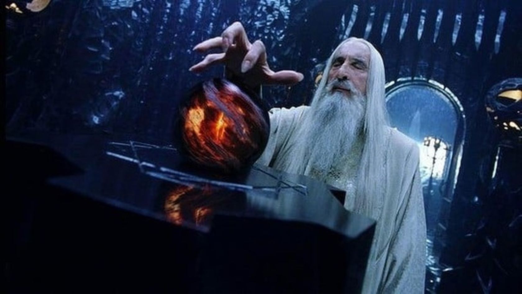 Old wizard with a long white beard raises a glowing fiery orb over a piano in a dark, fantasy setting.