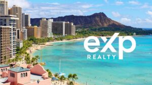 Aerial view of a tropical beachfront city with high-rise hotels along a turquoise bay and a mountain in the background, with the exp Realty logo overlaid.