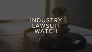 Gavel on a wooden desk with 'Industry Lawsuit Watch' text overlay, signaling a legal industry update