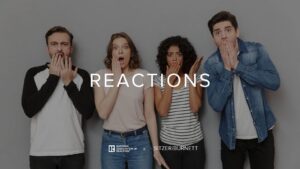 Four smiling adults stand against a gray wall, covering their mouths in surprise with 'REACTIONS' overlay.
