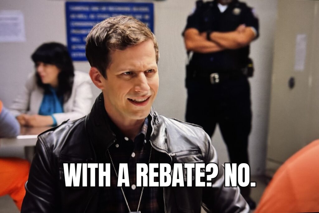 Man in a black leather jacket smirks in a tense room, with a police officer in the background; meme text reads 'WITH A REBATE? NO.'
